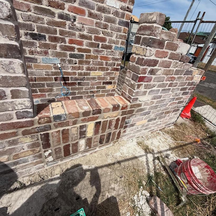 Brick pier with corbelled soldier detail